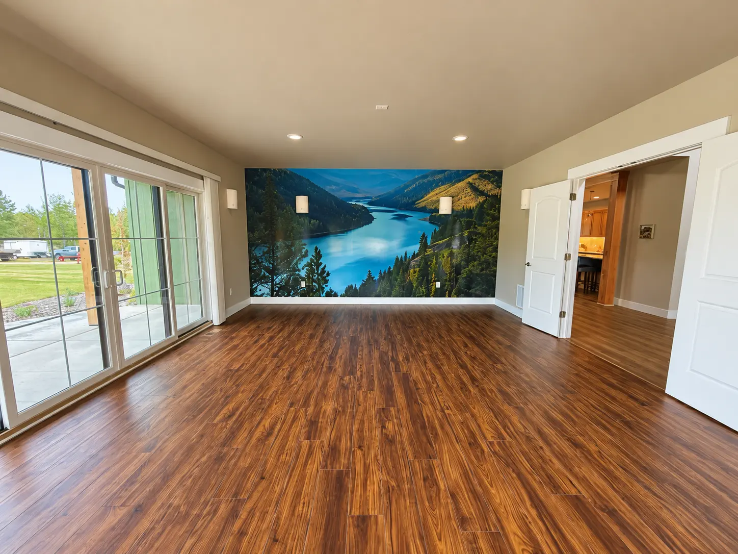 The Guidance Studio with wood floors and landscape mural