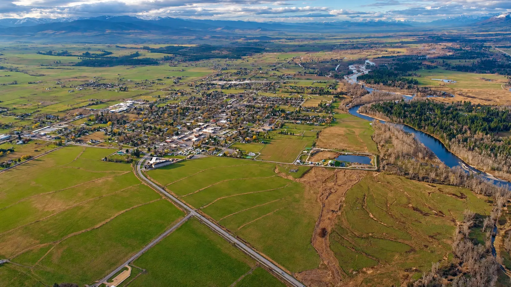 Aerial view of Stevensville and the Bitterroot River winding through the valley